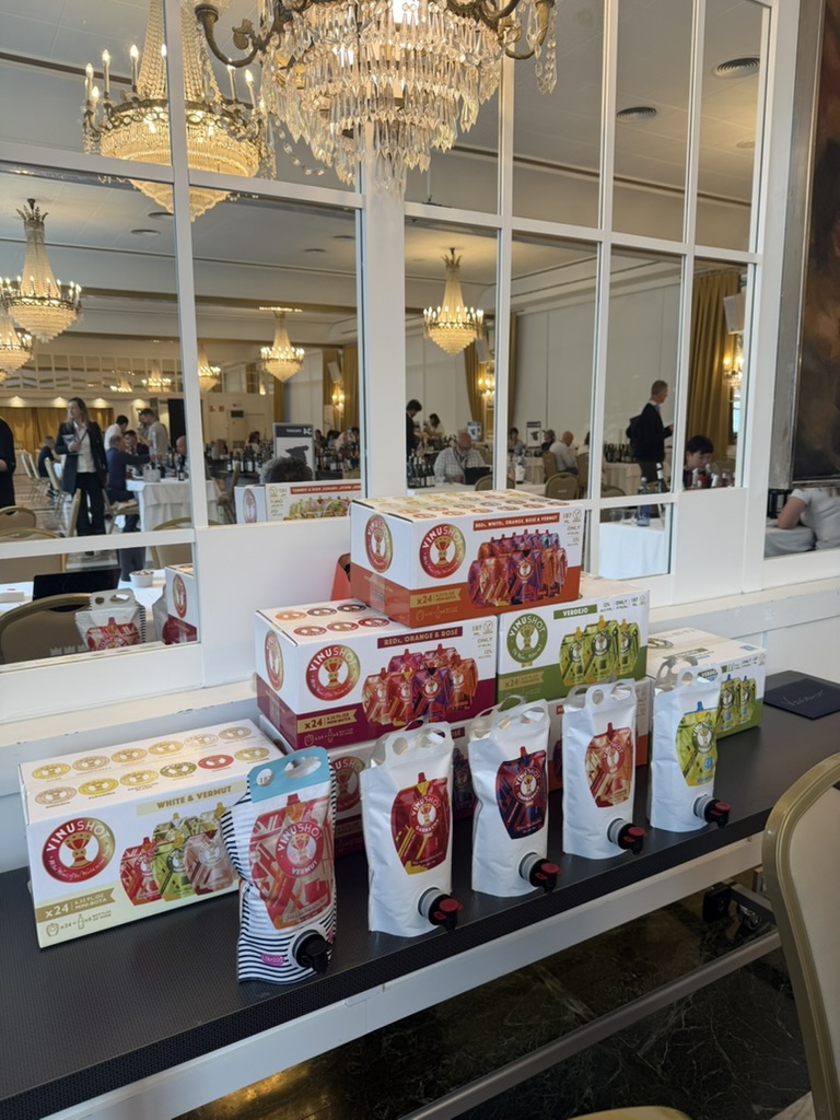 VinuShot cases and pouches on display at an industry tradeshow