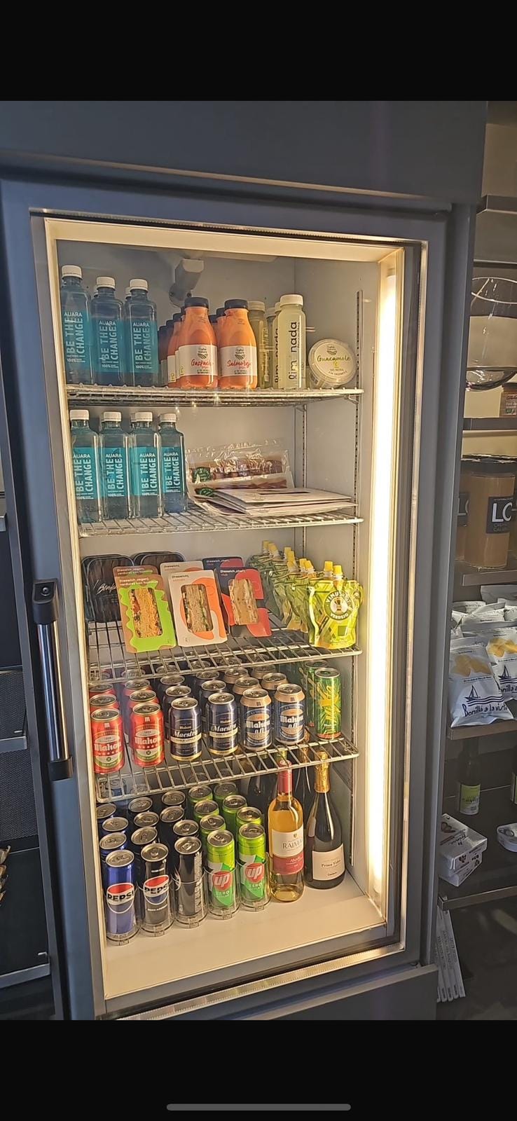 VinuShot pouches on shelf in a retail cooler
